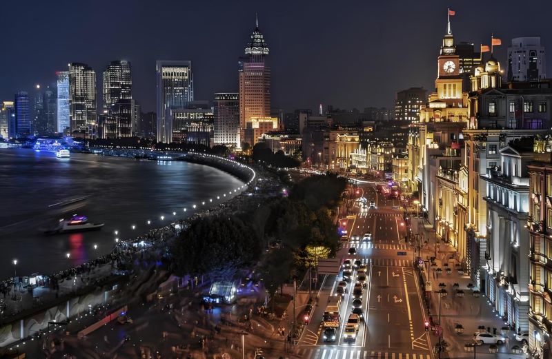 A view of Shanghai's urban area, featuring skyscrapers and a bustling city scene
